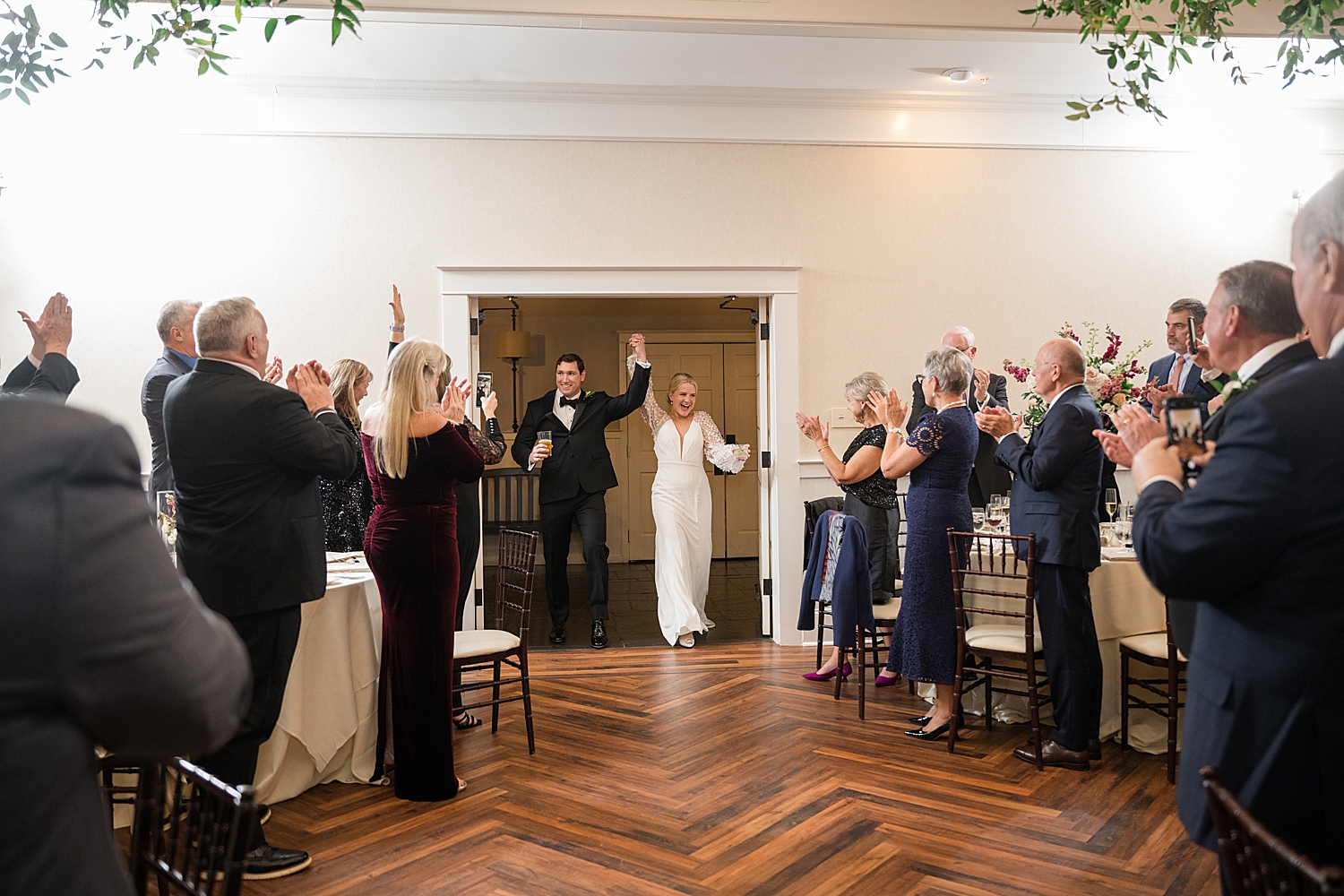 bride and groom enter reception