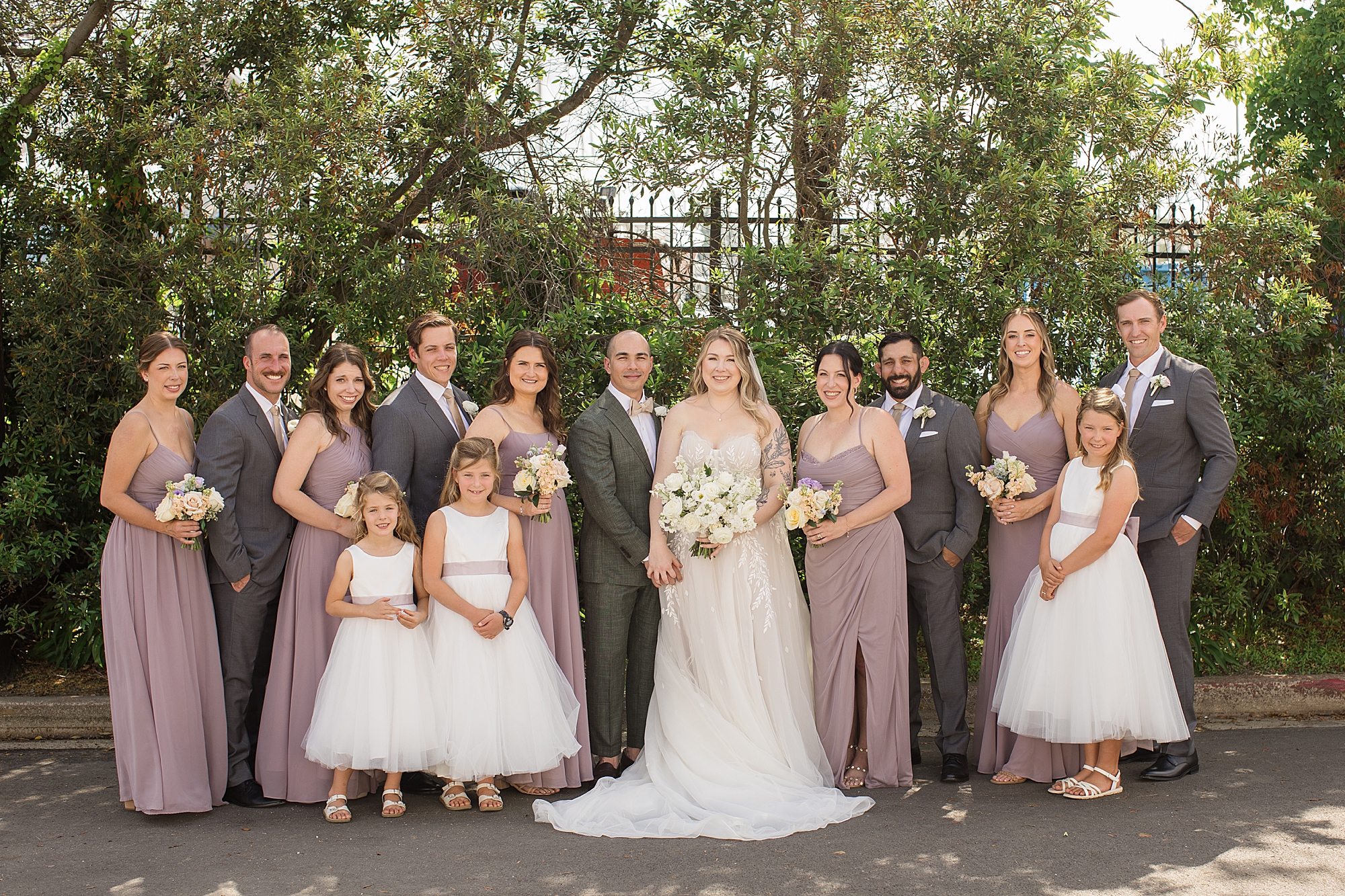 lilac bridesmaid dresses and soft cream blush peach florals