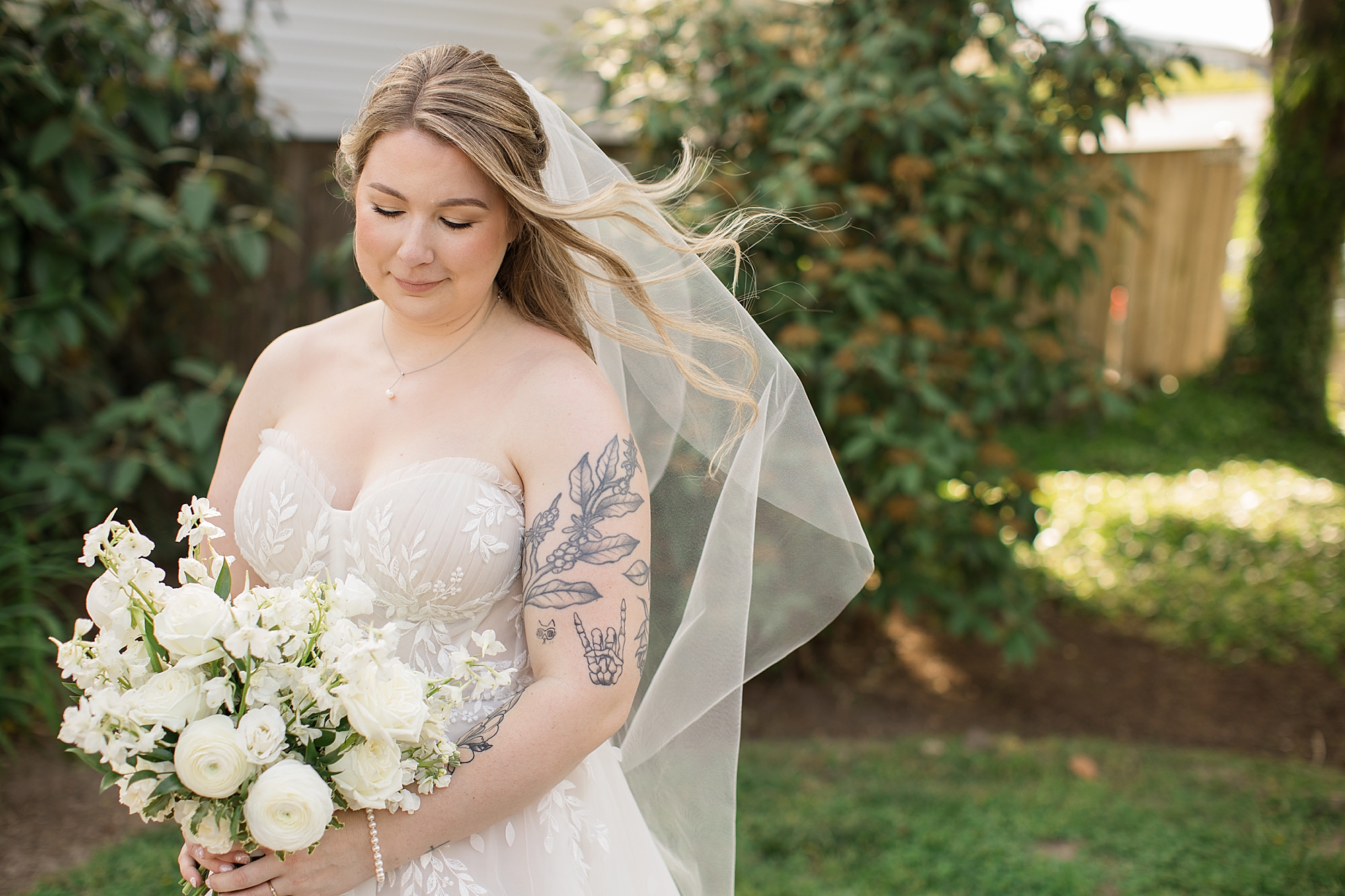 beautiful bride in a strapless lacy sexy wedding dress