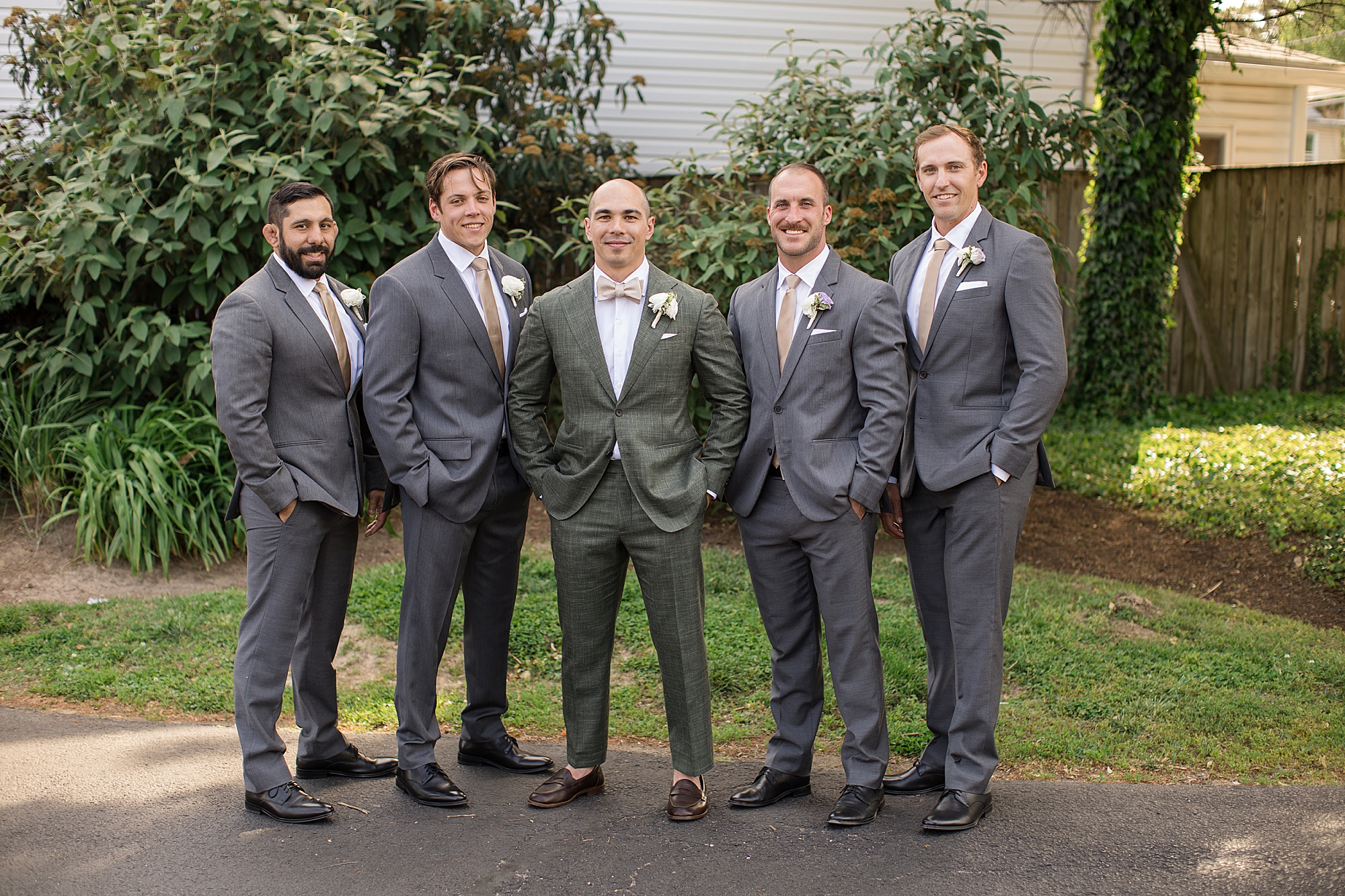 Sauve handsome groom in grey tux at Annapolis wedding